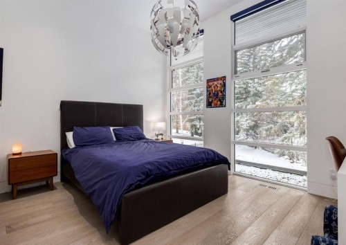 106 Pumpridge Place Sw, Calgary, AB - Indoor Photo Showing Bedroom