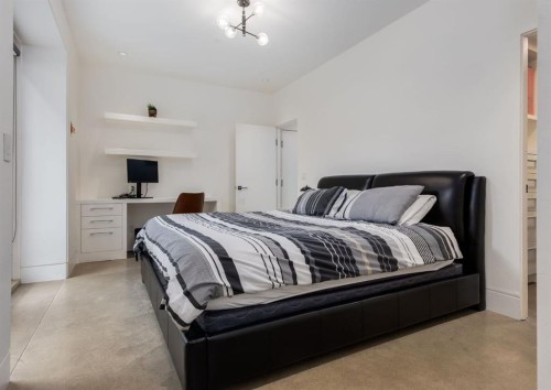 106 Pumpridge Place Sw, Calgary, AB - Indoor Photo Showing Bedroom