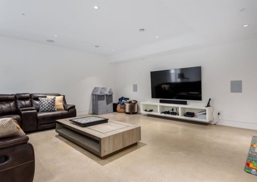 106 Pumpridge Place Sw, Calgary, AB - Indoor Photo Showing Living Room