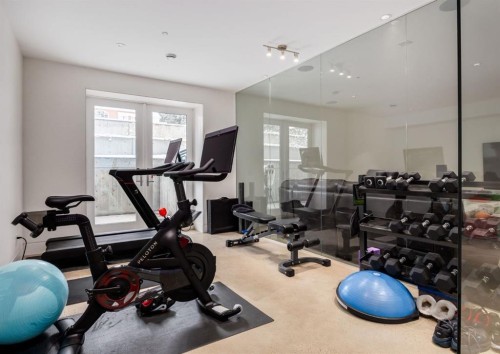 106 Pumpridge Place Sw, Calgary, AB - Indoor Photo Showing Gym Room