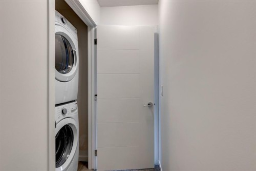 505 Copperstone Manor Se, Calgary, AB - Indoor Photo Showing Laundry Room