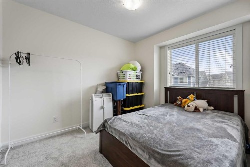 505 Copperstone Manor Se, Calgary, AB - Indoor Photo Showing Bedroom