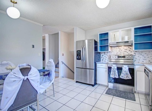 6307 Thornaby Way Nw, Calgary, AB - Indoor Photo Showing Kitchen With Stainless Steel Kitchen