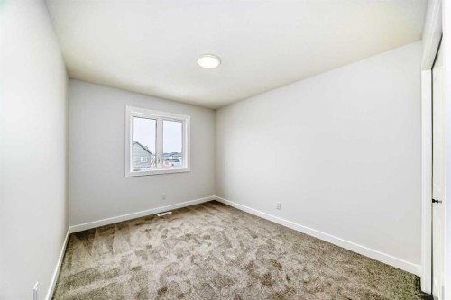 48 Monarch Bend, Rural Rocky View County, AB - Indoor Photo Showing Other Room