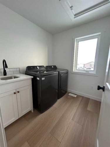 4 Williams Avenue, Olds, AB - Indoor Photo Showing Laundry Room