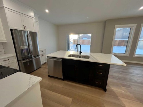 4 Williams Avenue, Olds, AB - Indoor Photo Showing Kitchen With Double Sink