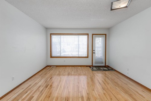 108 Quigley Close, Cochrane, AB - Indoor Photo Showing Other Room