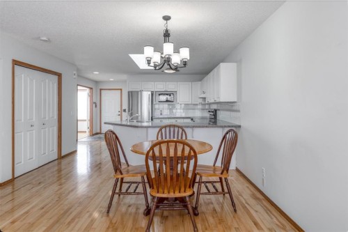 108 Quigley Close, Cochrane, AB - Indoor Photo Showing Dining Room