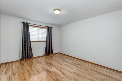 108 Quigley Close, Cochrane, AB - Indoor Photo Showing Other Room