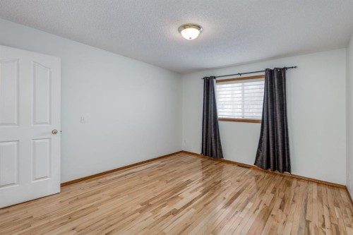 108 Quigley Close, Cochrane, AB - Indoor Photo Showing Other Room
