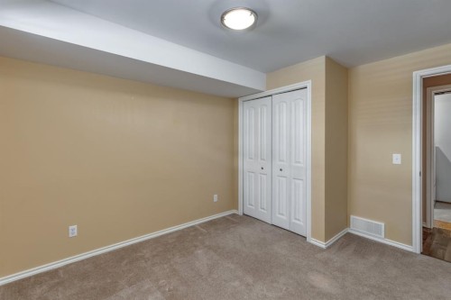 108 Quigley Close, Cochrane, AB - Indoor Photo Showing Other Room