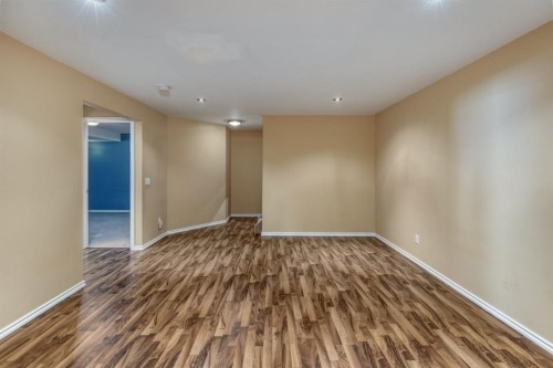 108 Quigley Close, Cochrane, AB - Indoor Photo Showing Other Room
