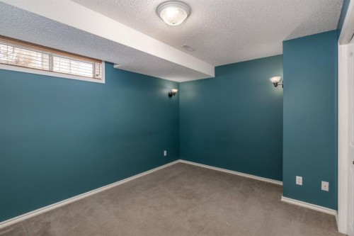 108 Quigley Close, Cochrane, AB - Indoor Photo Showing Other Room