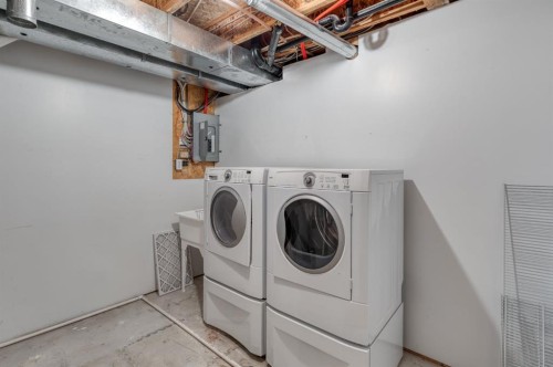 108 Quigley Close, Cochrane, AB - Indoor Photo Showing Laundry Room