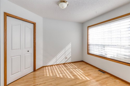 108 Quigley Close, Cochrane, AB - Indoor Photo Showing Other Room