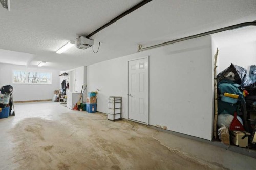 349 Walden Drive Se, Calgary, AB - Indoor Photo Showing Garage