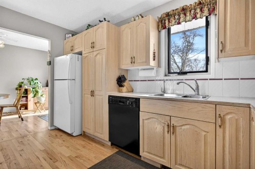152 Maddock Way Ne, Calgary, AB - Indoor Photo Showing Kitchen With Double Sink