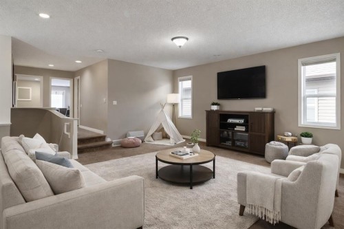 115 Auburn Glen Way Se, Calgary, AB - Indoor Photo Showing Living Room