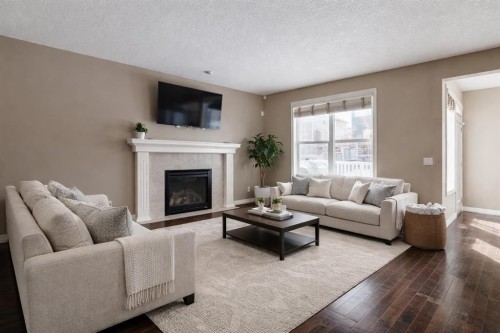 115 Auburn Glen Way Se, Calgary, AB - Indoor Photo Showing Living Room With Fireplace