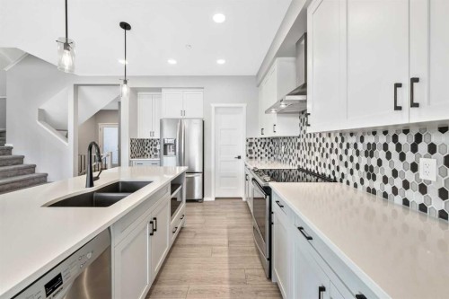 98 Lucas Crescent Nw, Calgary, AB - Indoor Photo Showing Kitchen With Stainless Steel Kitchen With Double Sink With Upgraded Kitchen