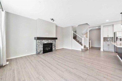 98 Lucas Crescent Nw, Calgary, AB - Indoor With Fireplace