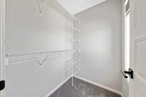 98 Lucas Crescent Nw, Calgary, AB - Indoor With Storage