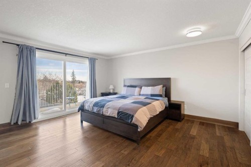 40 Wood Crescent Sw, Calgary, AB - Indoor Photo Showing Bedroom