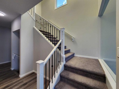 90 Howse Common Ne, Calgary, AB - Indoor Photo Showing Other Room