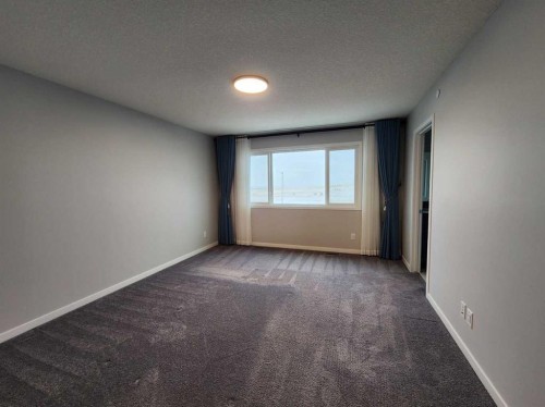90 Howse Common Ne, Calgary, AB - Indoor Photo Showing Other Room