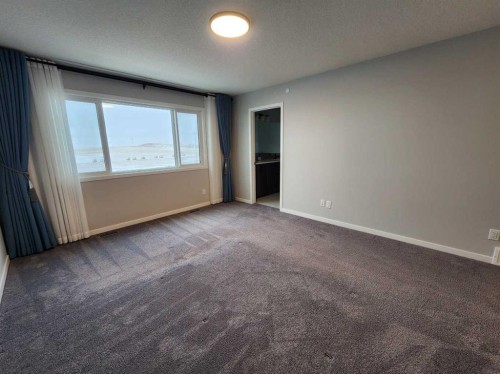 90 Howse Common Ne, Calgary, AB - Indoor Photo Showing Other Room