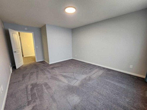90 Howse Common Ne, Calgary, AB - Indoor Photo Showing Other Room