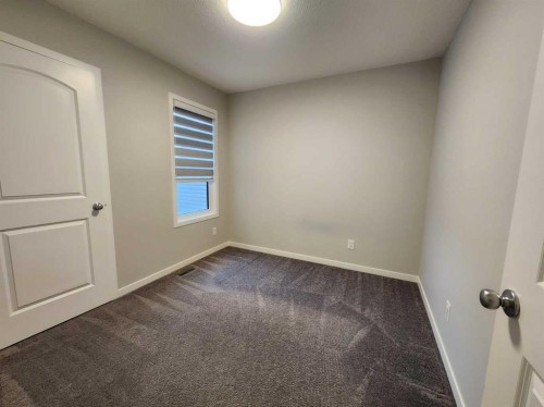 90 Howse Common Ne, Calgary, AB - Indoor Photo Showing Other Room