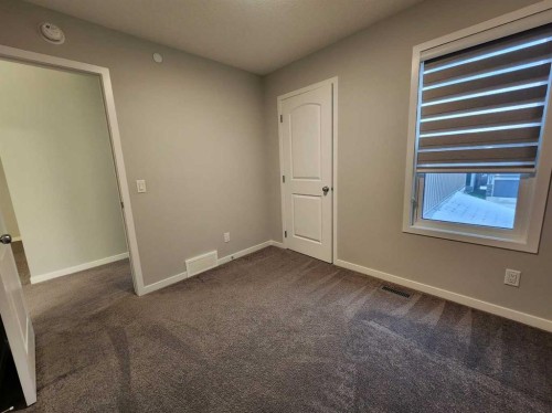 90 Howse Common Ne, Calgary, AB - Indoor Photo Showing Other Room