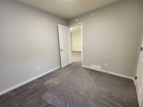 90 Howse Common Ne, Calgary, AB - Indoor Photo Showing Other Room