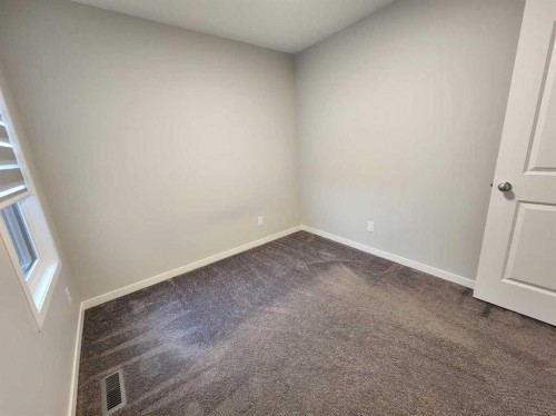90 Howse Common Ne, Calgary, AB - Indoor Photo Showing Other Room