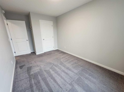90 Howse Common Ne, Calgary, AB - Indoor Photo Showing Other Room