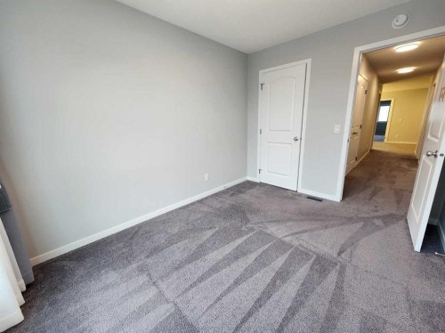 90 Howse Common Ne, Calgary, AB - Indoor Photo Showing Other Room