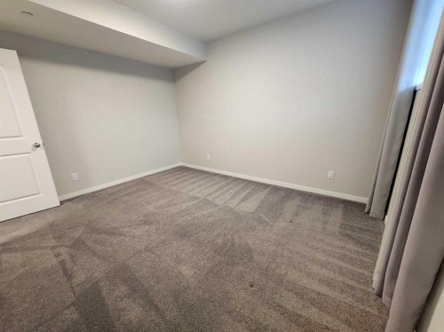 90 Howse Common Ne, Calgary, AB - Indoor Photo Showing Other Room