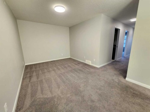 90 Howse Common Ne, Calgary, AB - Indoor Photo Showing Other Room