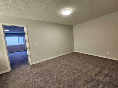 90 Howse Common Ne, Calgary, AB - Indoor Photo Showing Other Room