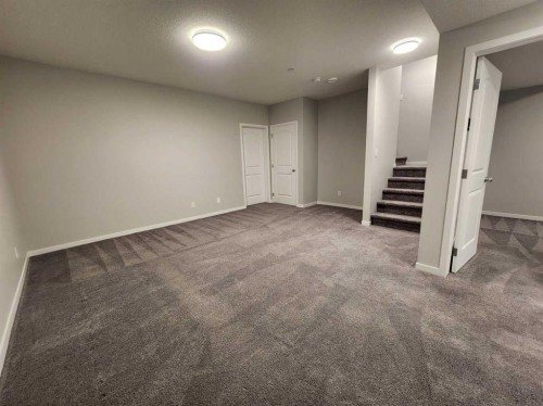 90 Howse Common Ne, Calgary, AB - Indoor Photo Showing Other Room