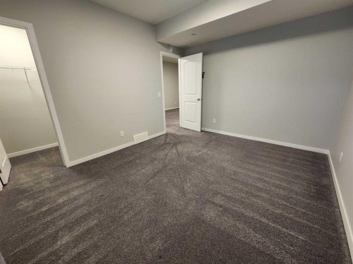 90 Howse Common Ne, Calgary, AB - Indoor Photo Showing Other Room