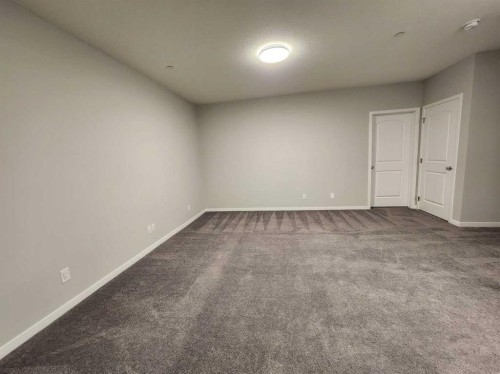 90 Howse Common Ne, Calgary, AB - Indoor Photo Showing Other Room