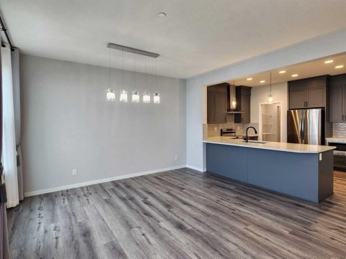 90 Howse Common Ne, Calgary, AB - Indoor Photo Showing Kitchen With Stainless Steel Kitchen With Upgraded Kitchen