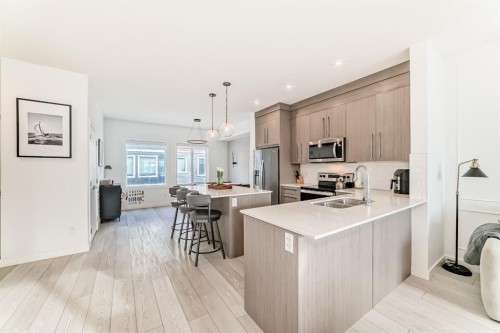 202 Creekstone Drive Sw, Calgary, AB - Indoor Photo Showing Kitchen With Double Sink
