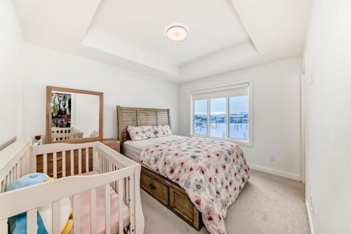 202 Creekstone Drive Sw, Calgary, AB - Indoor Photo Showing Bedroom