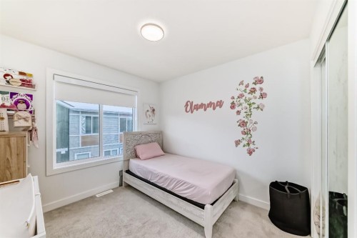 202 Creekstone Drive Sw, Calgary, AB - Indoor Photo Showing Bedroom