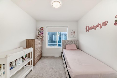 202 Creekstone Drive Sw, Calgary, AB - Indoor Photo Showing Bedroom