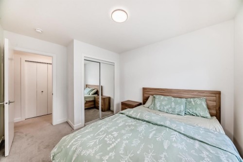 202 Creekstone Drive Sw, Calgary, AB - Indoor Photo Showing Bedroom
