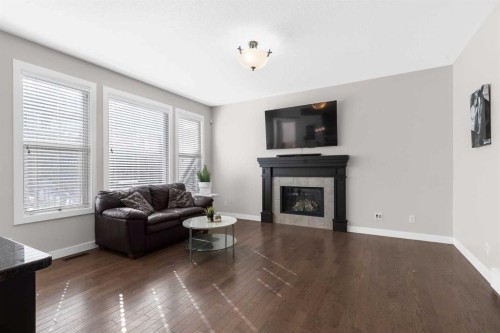 282 Mountainview Drive, Okotoks, AB - Indoor Photo Showing Living Room With Fireplace